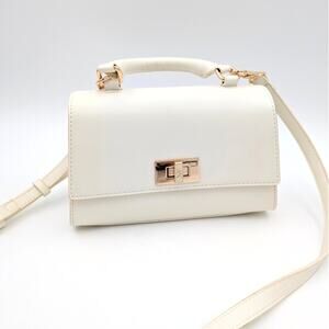 Anne Klein Solid Crossbody Bag with Twist Lock Closure and Top Handle